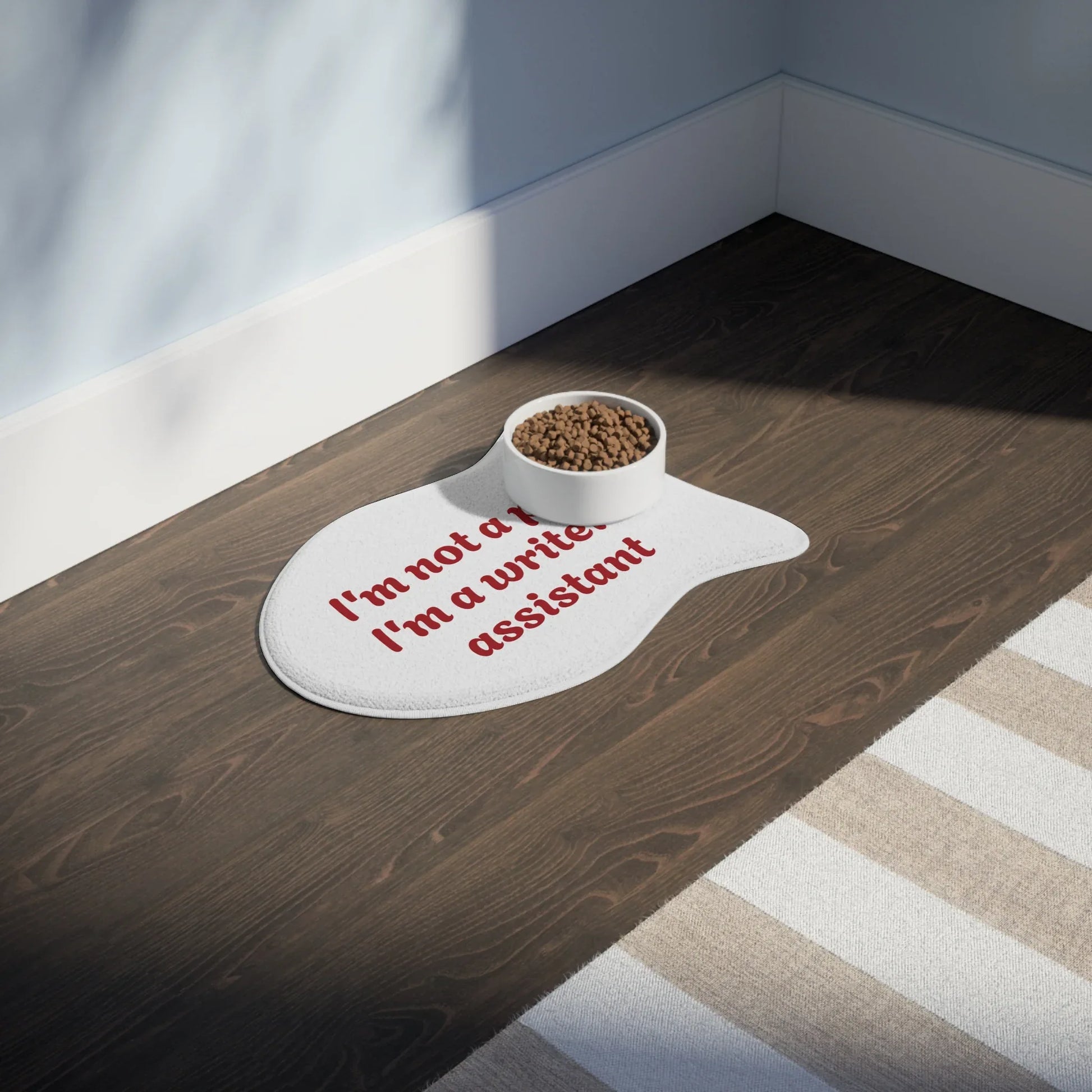 Funny Pet Feeding Mat - "I'm Not a Pet, I'm a Writer's Assistant" - The Dreamer's Bookshop.