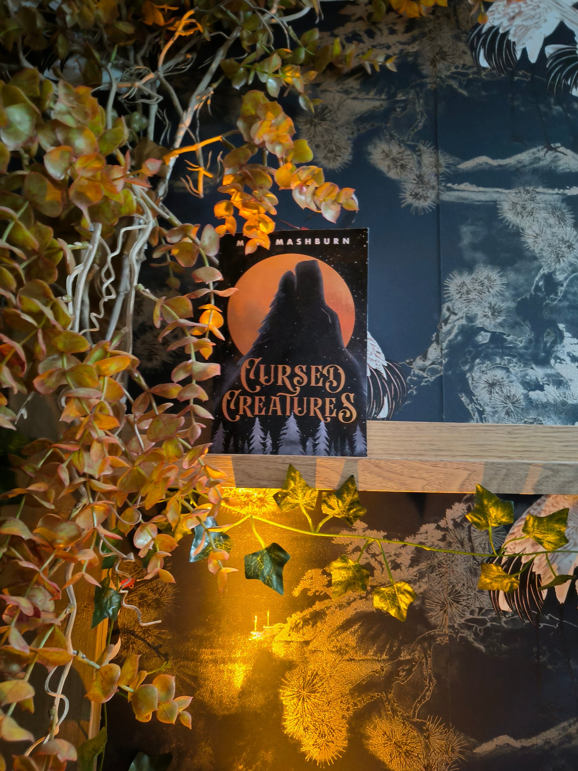 A book: Cursed Creatures.