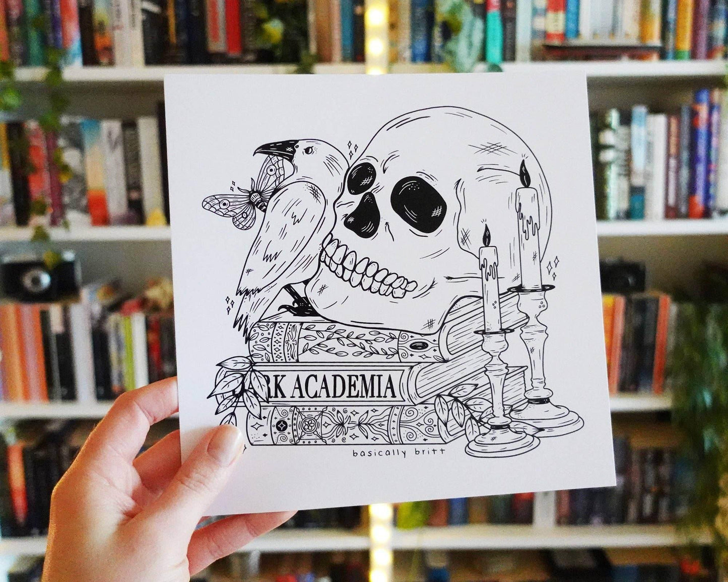 Basically Britt - Dark Academia Print with a skull on a stack of books - The Dreamer's Bookshop.